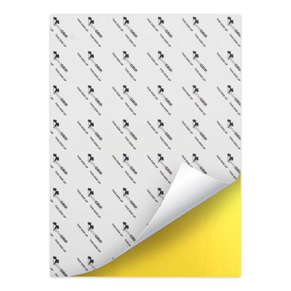 PrintGRIP Yellow adhesive sheet with backing partially peeled away