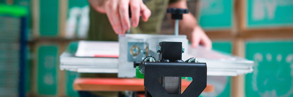 Should DIY Screen Printers Get a Riley Hopkins 150 Press or a DIY Press?  | Screenprinting.com
