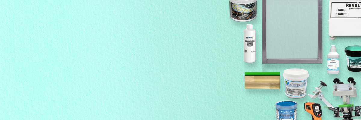 Grouping of inks, chemicals, and other products on a mint green background.
