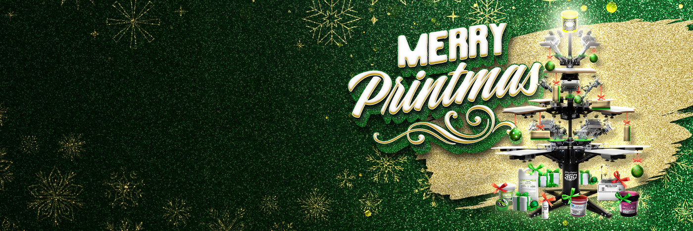 “Merry Printmas” holiday graphic on a landscape green glitter background with gold snowflakes, featuring a gold glitter panel and a screen-printing press styled like a Christmas tree with ornaments and wrapped gifts at the base. 