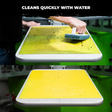 PrintGRIP Yellow adhesive sheet being easily scrubbed clean
