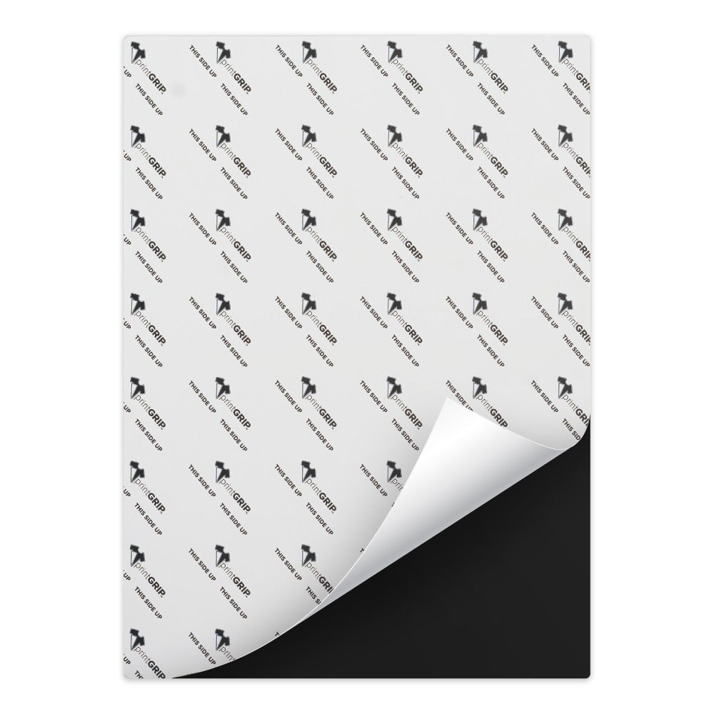PrintGRIP Black adhesive sheet with backing partially peeled away