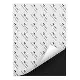 PrintGRIP Black adhesive sheet with backing partially peeled away